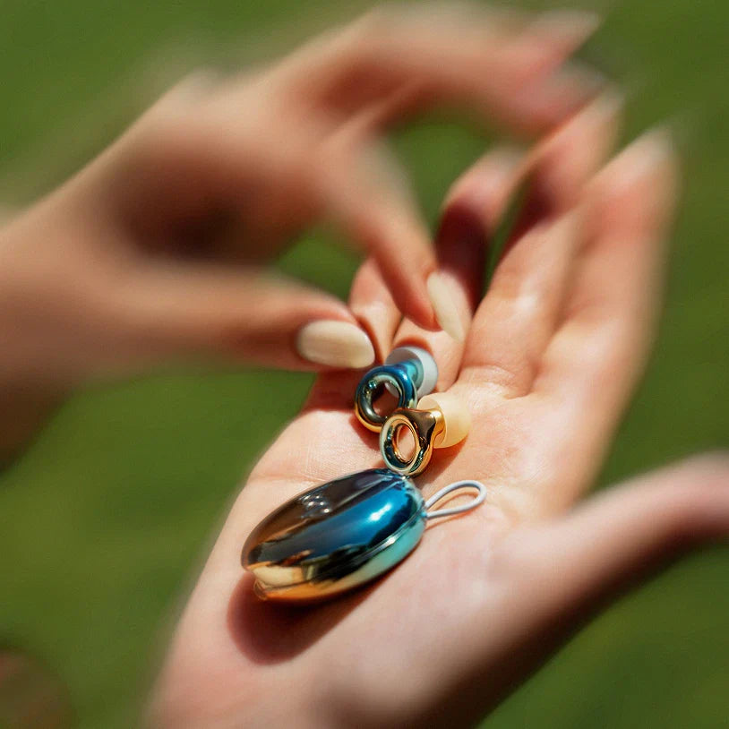 Loop Experience 2 Coachella earplugs and case in woman's hand